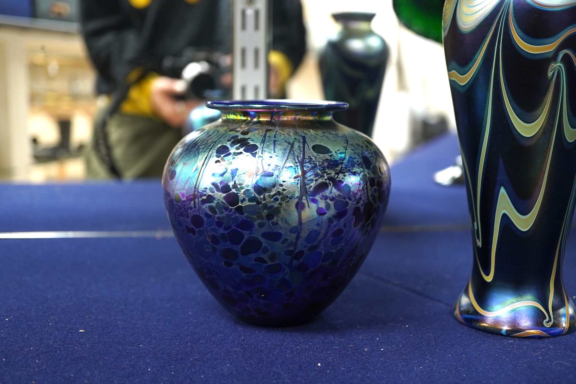 An Isle of Wight iridescent glass vase, Richard Golding Okra Luxor vase and Jack in Pulpit the box vase (3) tallest 38.5cm